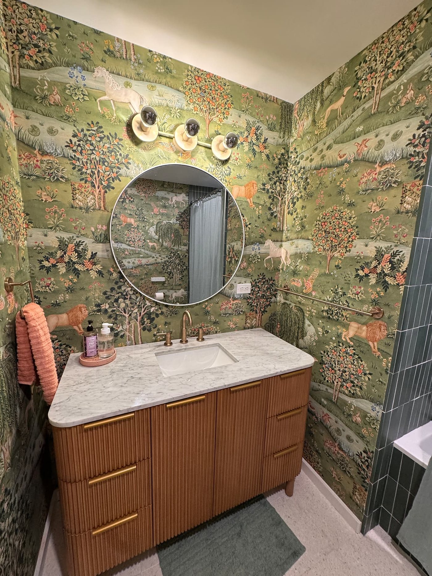 Bathroom with a garden mural wallcovering, installed by The Style Maison