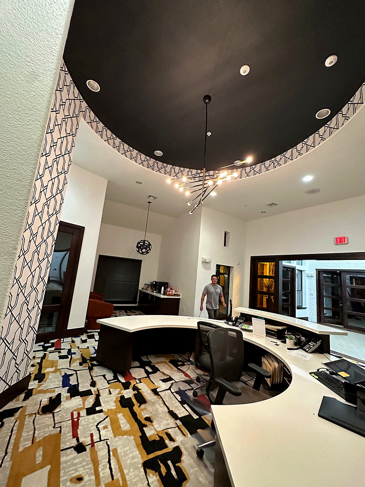 Wallpaper on a curved wall at a commercial reception area